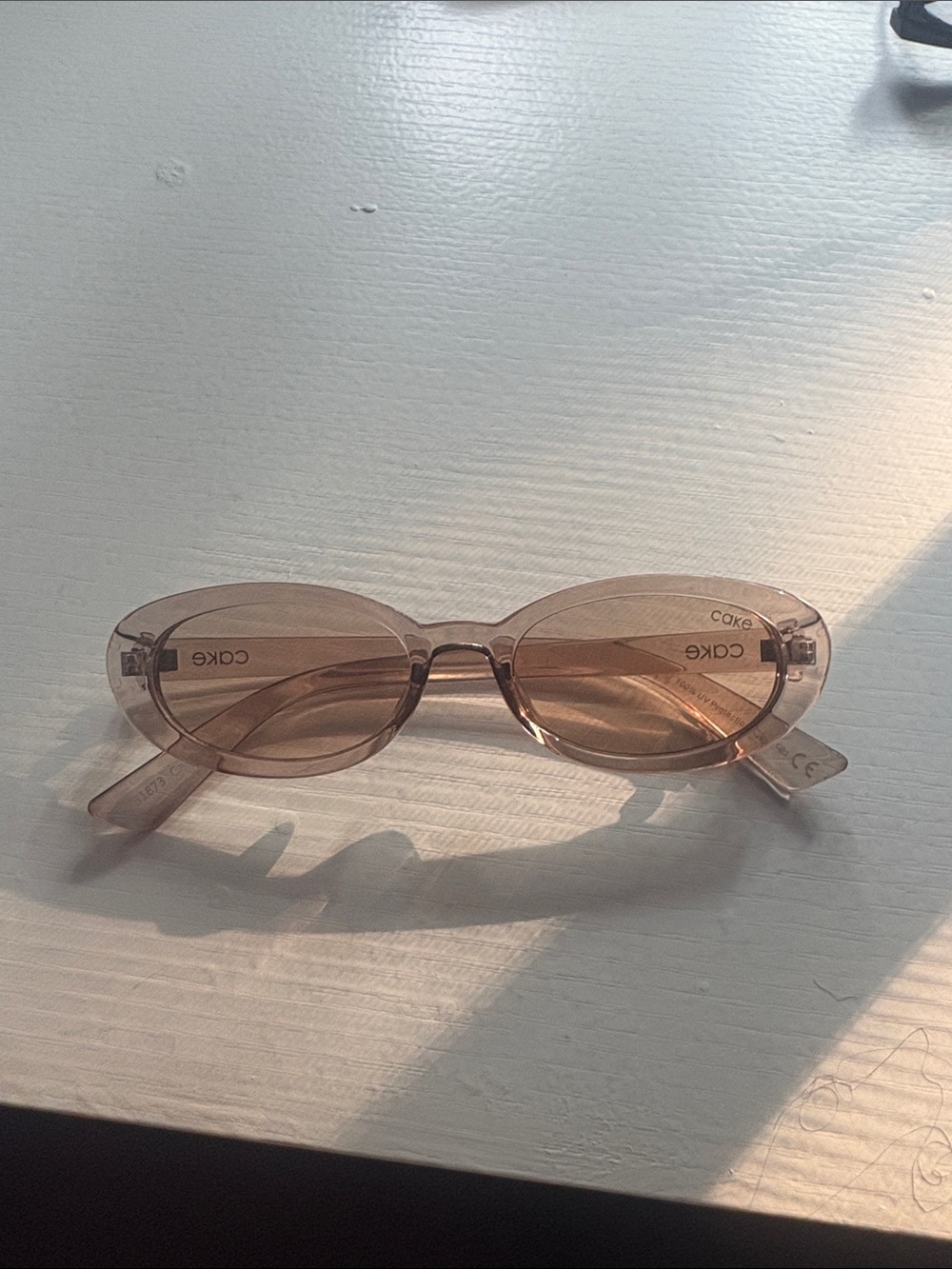 Cake Oval Sunglasses in Light Brown Transparent